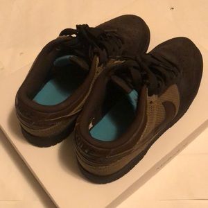 Low top Nike dunks. Brown suede
